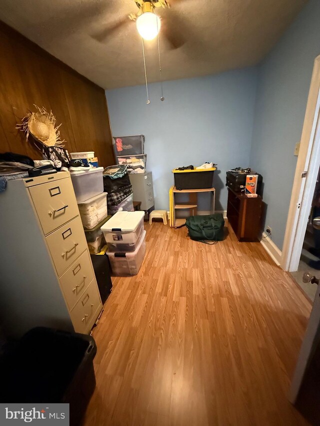 storage room with ceiling fan