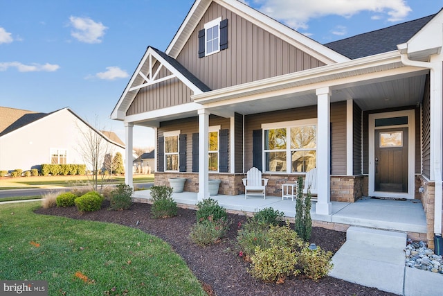 craftsman-style home with covered porch