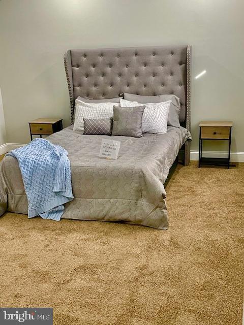 bedroom featuring carpet flooring