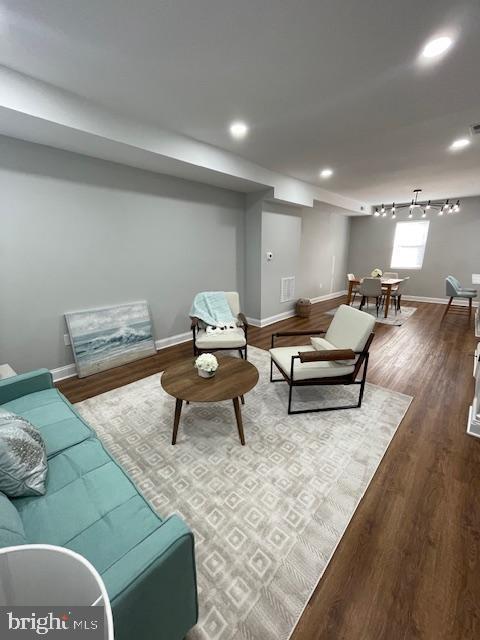 living room featuring hardwood / wood-style floors