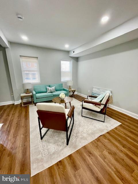 living room with wood-type flooring