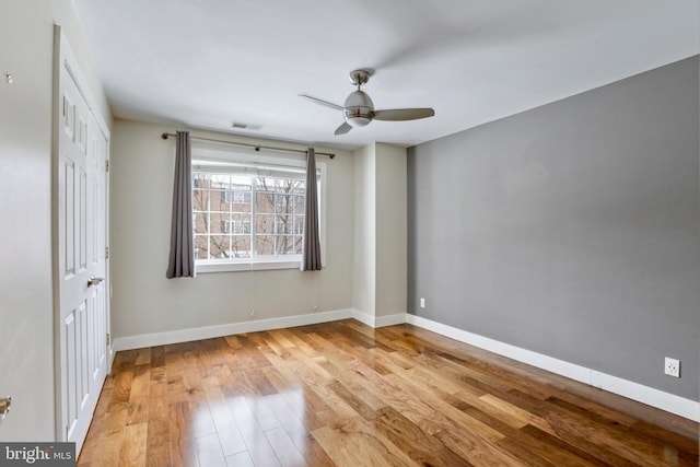 unfurnished bedroom with light hardwood / wood-style floors and ceiling fan