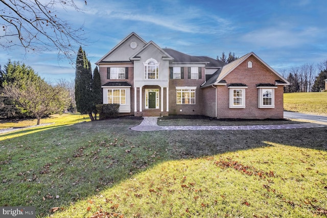 view of front facade featuring a front lawn