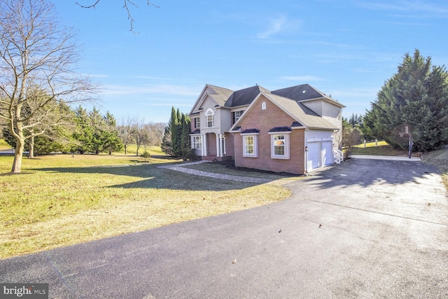 view of home's exterior featuring a garage and a lawn