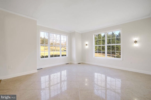 unfurnished room with plenty of natural light and ornamental molding