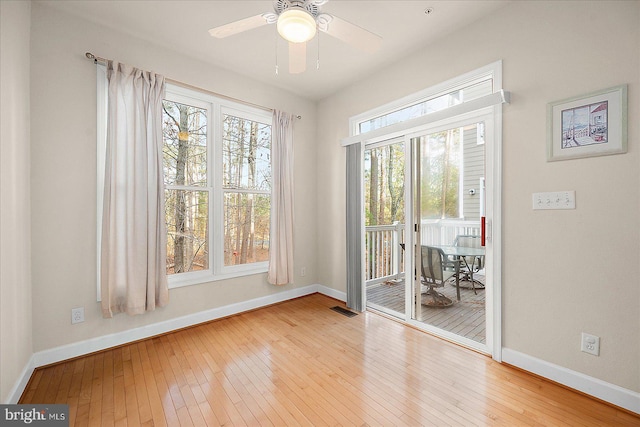 interior space with ceiling fan and light wood-type flooring