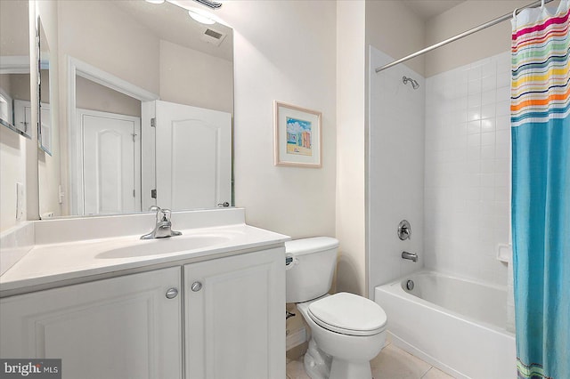 full bathroom with tile patterned flooring, shower / bath combo, vanity, and toilet