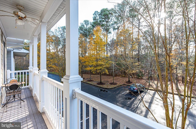 balcony featuring ceiling fan and covered porch