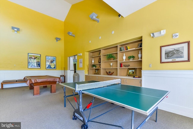 recreation room featuring carpet, built in shelves, high vaulted ceiling, and pool table