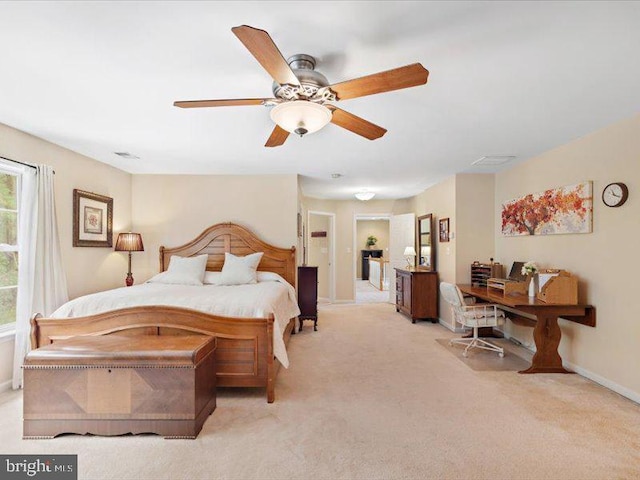 bedroom with light carpet and ceiling fan