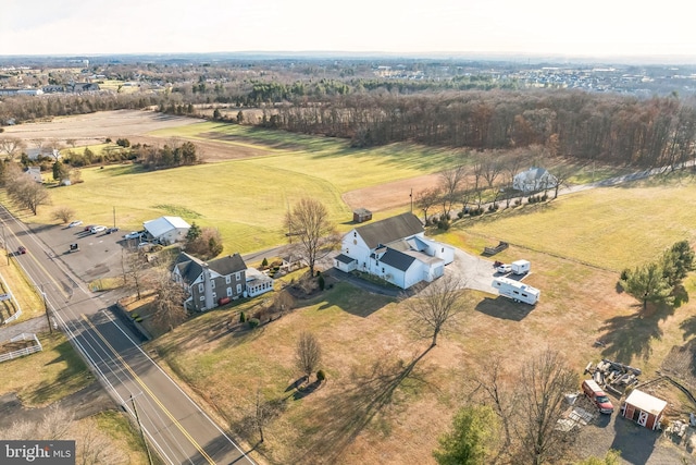 birds eye view of property featuring a rural view