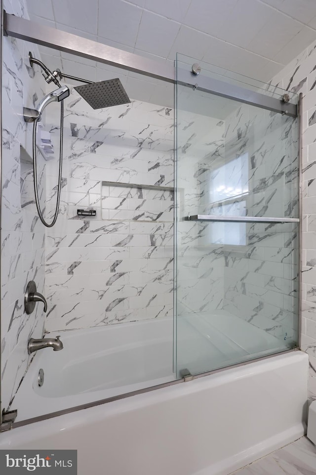 bathroom featuring enclosed tub / shower combo