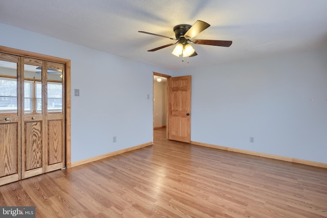 interior space featuring ceiling fan and light wood-type flooring