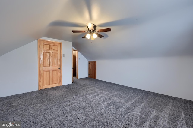 bonus room with carpet floors, vaulted ceiling, and ceiling fan