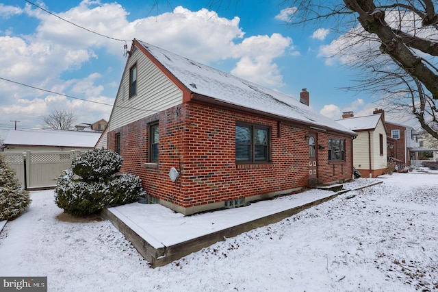 view of snow covered property