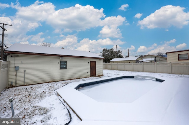 view of snow covered house