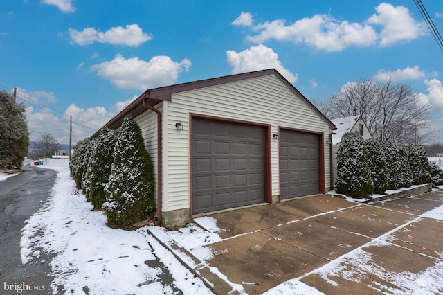 view of snow covered garage