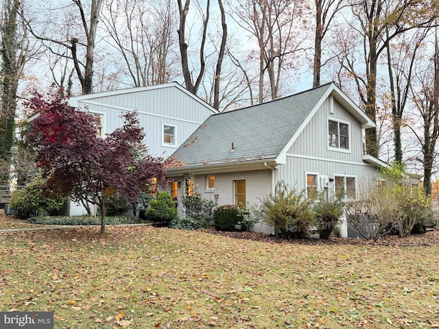 view of home's exterior featuring a yard