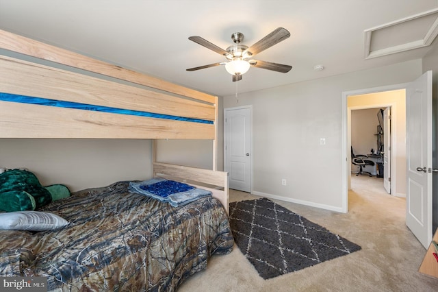 bedroom with ceiling fan and light colored carpet