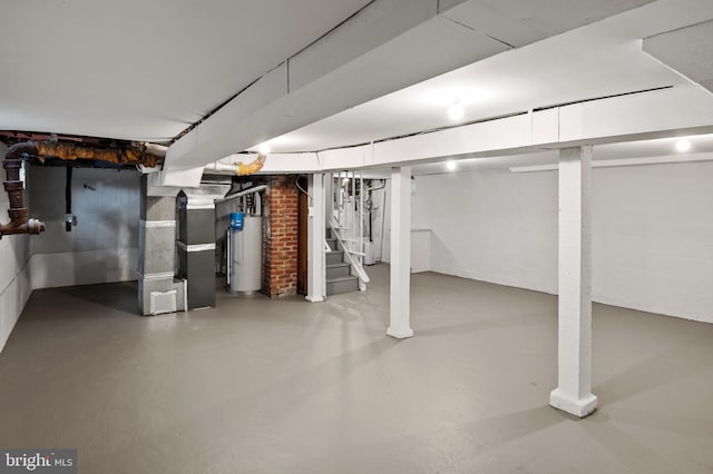 basement with heating unit and water heater