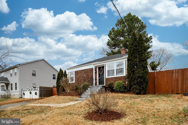 view of front of home with a front lawn