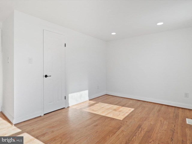 unfurnished room featuring light hardwood / wood-style flooring