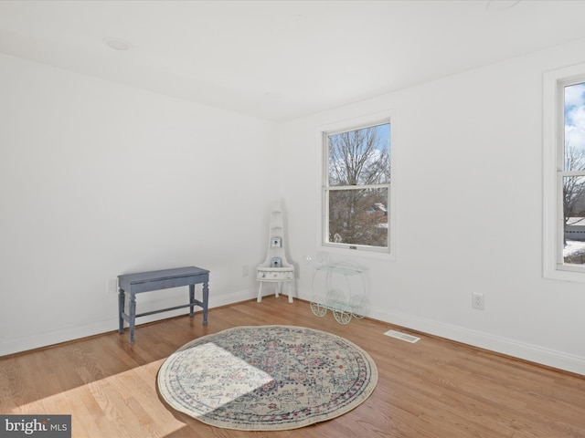 interior space with hardwood / wood-style flooring