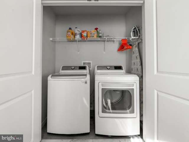 laundry area featuring independent washer and dryer