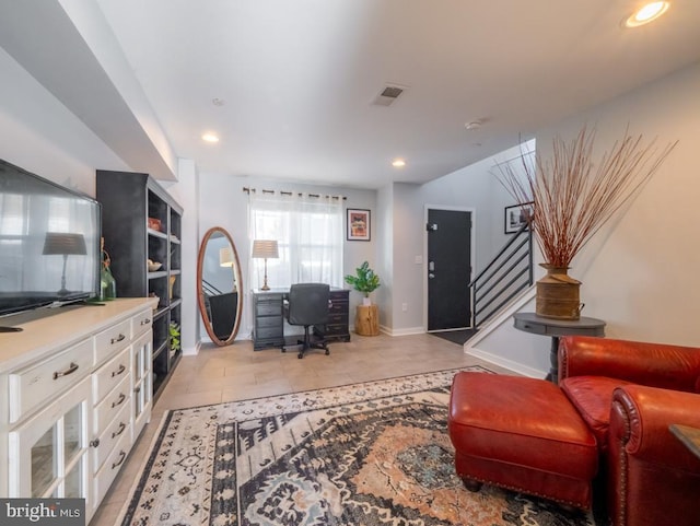 interior space featuring light tile patterned flooring