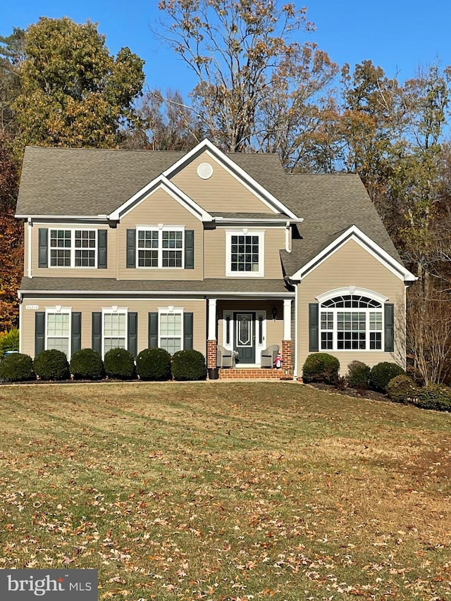 view of front of home featuring a front lawn