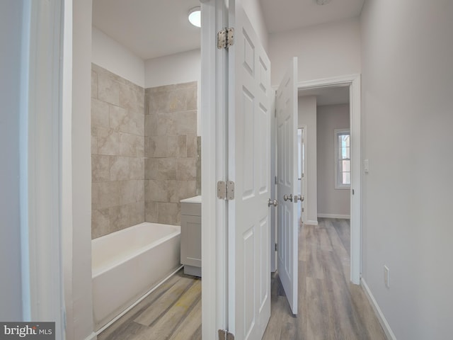 bathroom featuring hardwood / wood-style floors and vanity