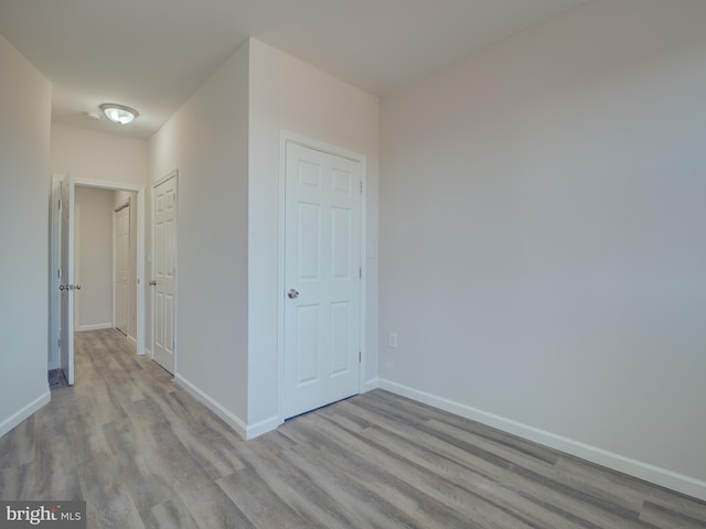 hallway featuring light hardwood / wood-style floors