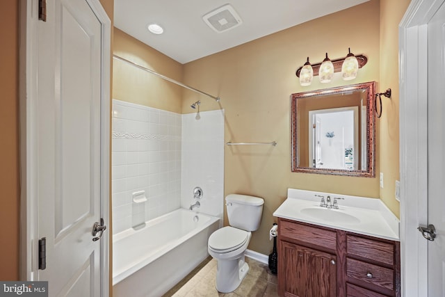 full bathroom featuring vanity, tile patterned floors, toilet, and bathtub / shower combination