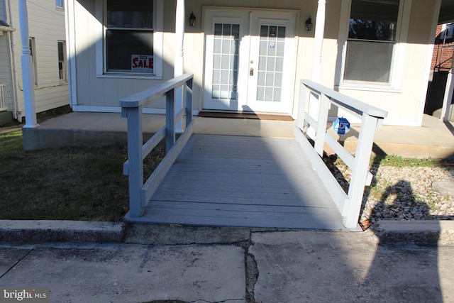 entrance to property featuring french doors