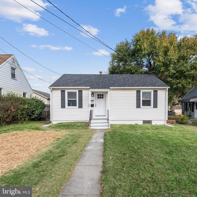 view of front of home featuring a front lawn