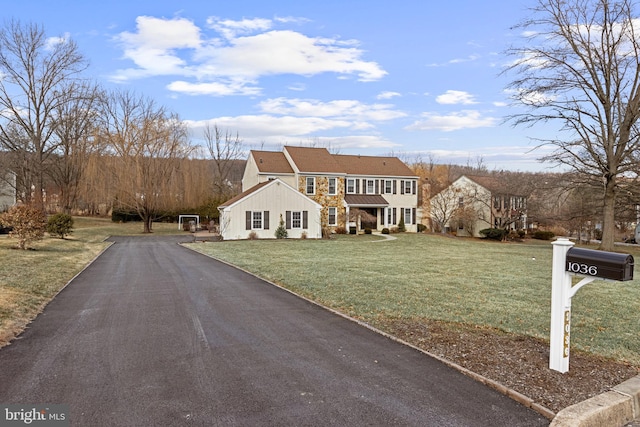 view of front facade with a front yard