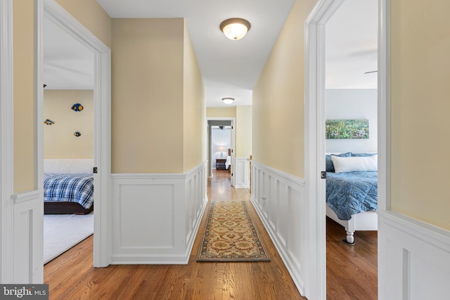 hall with light hardwood / wood-style flooring