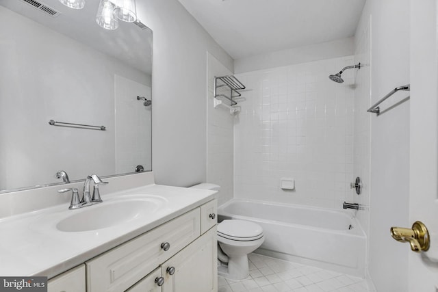 full bathroom featuring toilet, tile patterned flooring, bathing tub / shower combination, and vanity