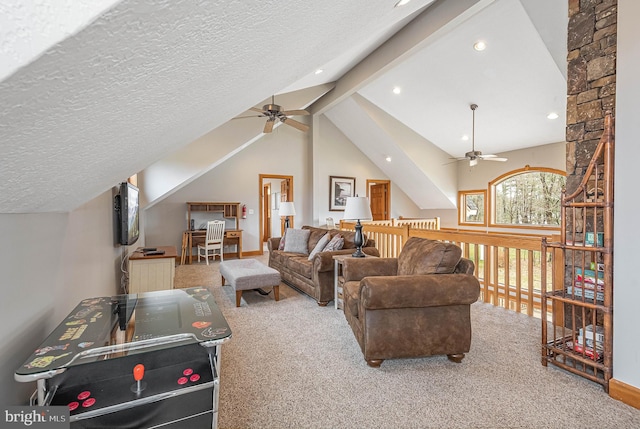 living room featuring carpet flooring, ceiling fan, beamed ceiling, and a textured ceiling