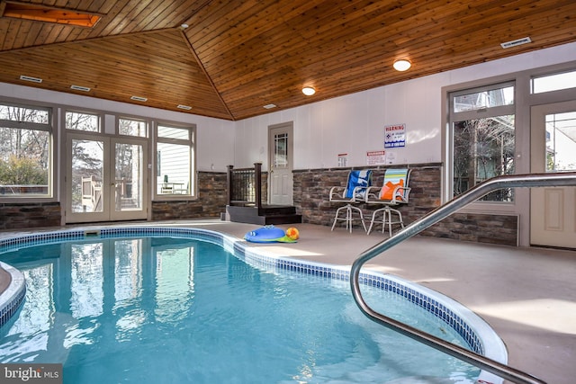 view of pool featuring a skylight