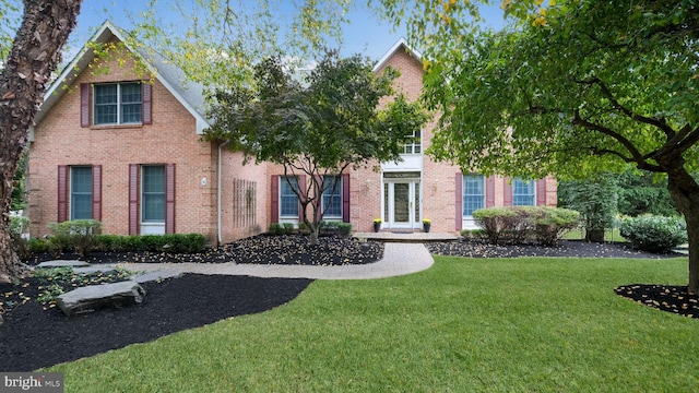 view of front of home with a front yard