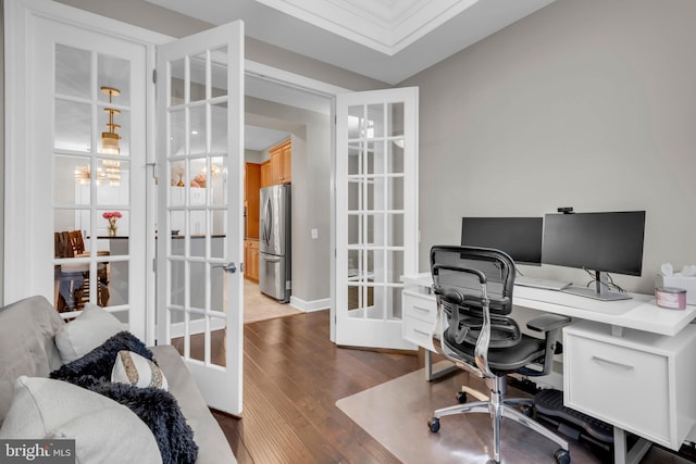 office space featuring french doors, hardwood / wood-style flooring, and ornamental molding