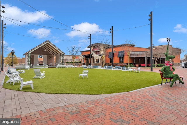 view of home's community featuring a lawn