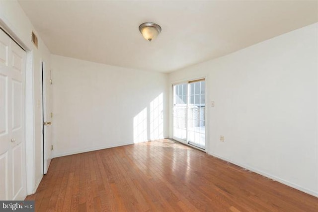 1517 S 6th St, Philadelphia, PA 19147 - empty room with hardwood / wood-style flooring and baseboards