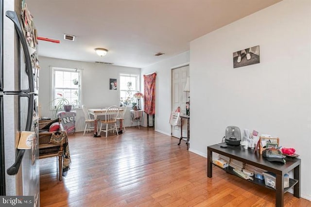 interior space with hardwood / wood-style flooring