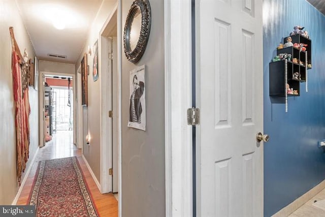 hall featuring light hardwood / wood-style flooring