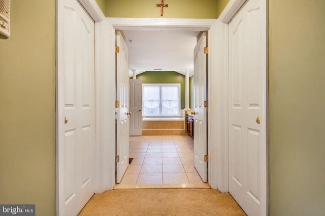 hallway with light tile patterned flooring