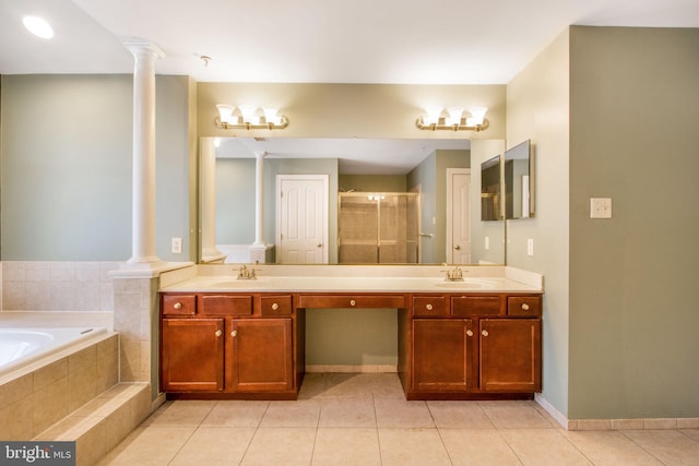 bathroom with vanity, tile patterned flooring, and ornate columns