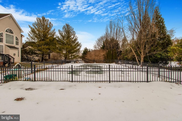 view of snow covered gate