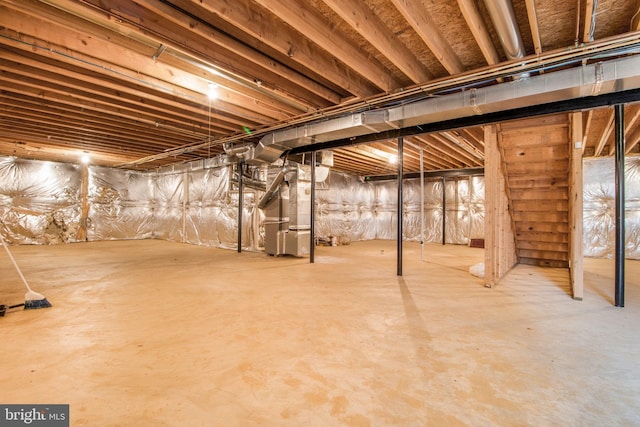 basement featuring heating unit